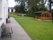 Garden with pergola and sandpit